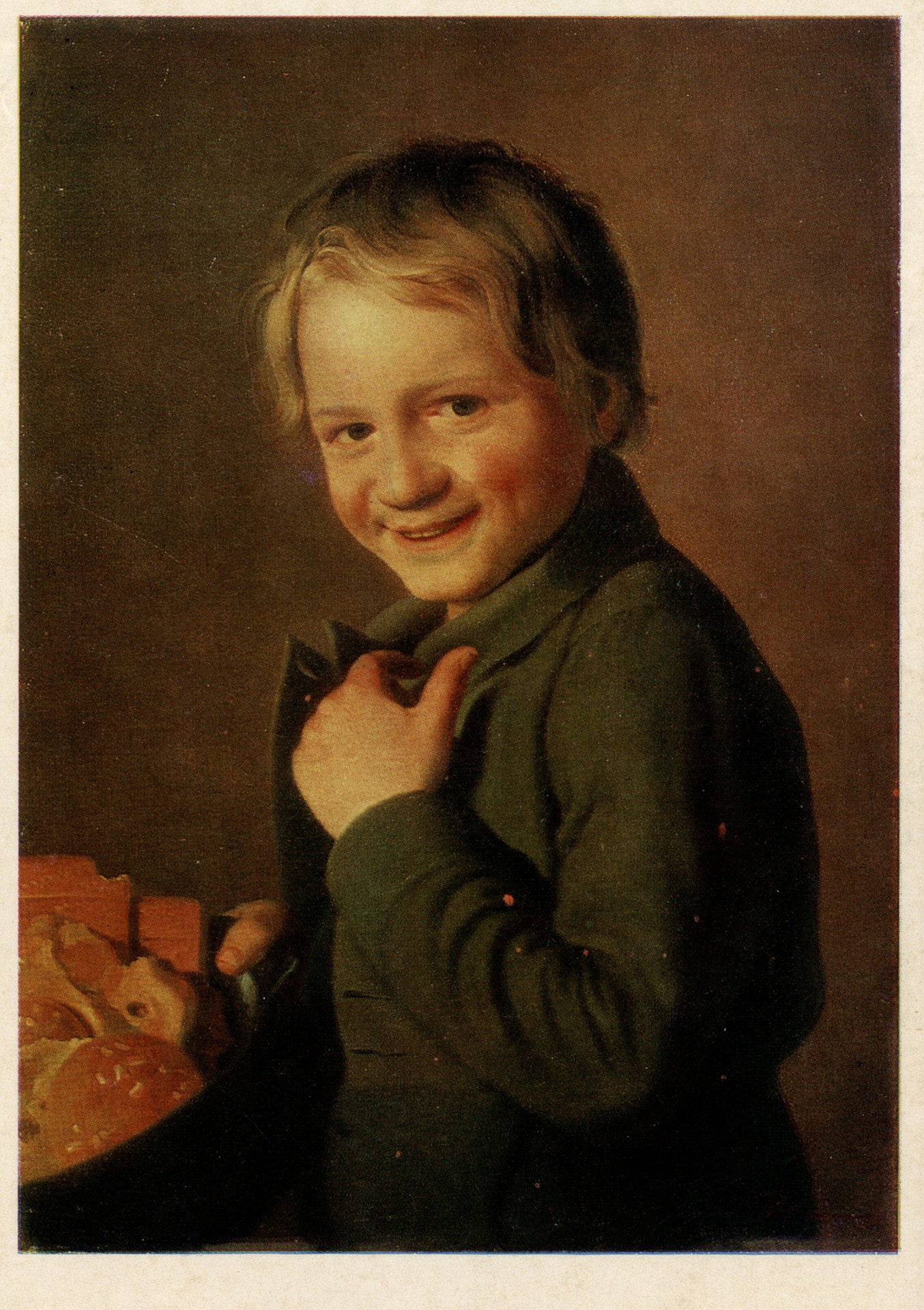 Смеющийся мальчик с пряниками