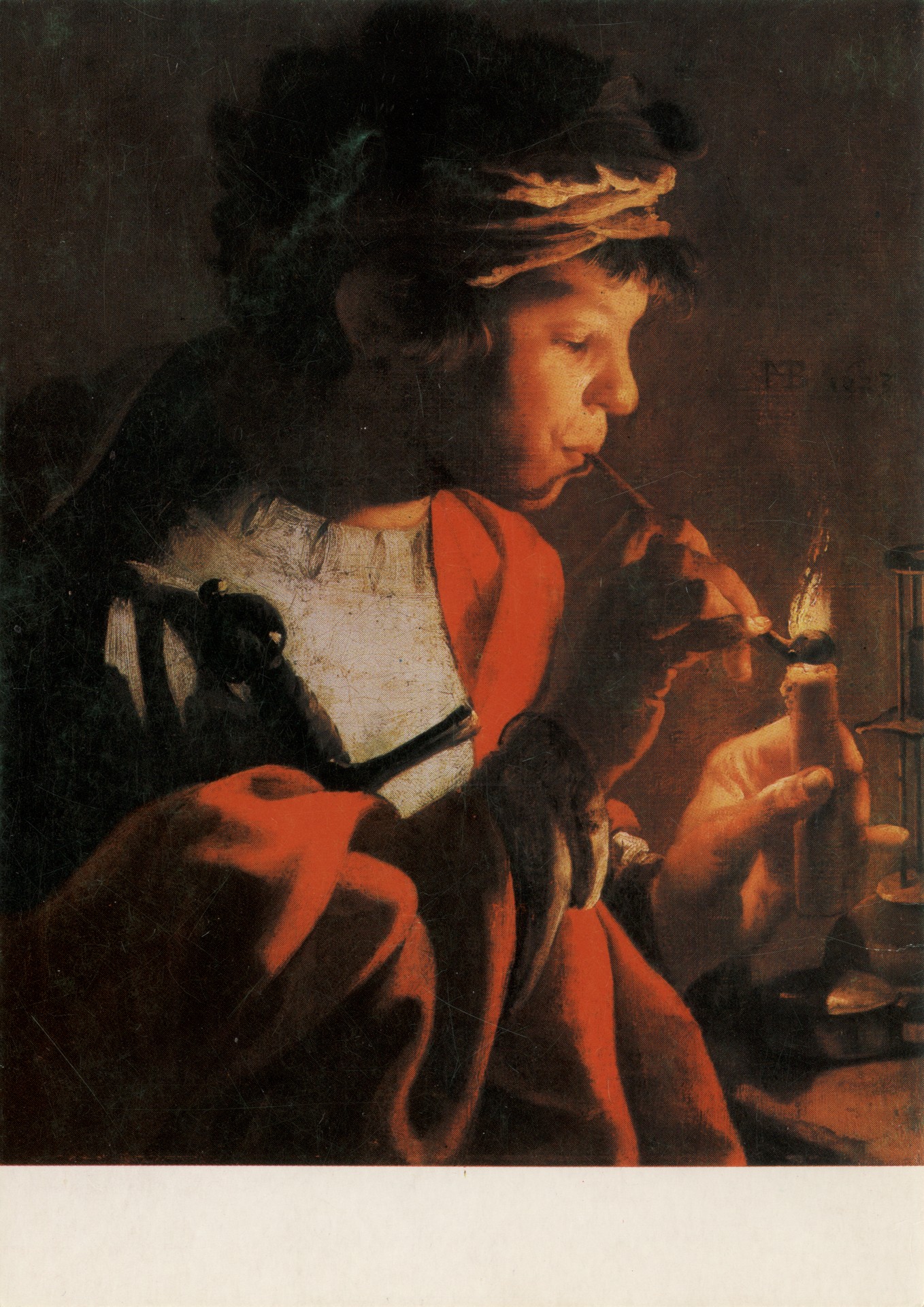 Мальчик, закуривающий трубку